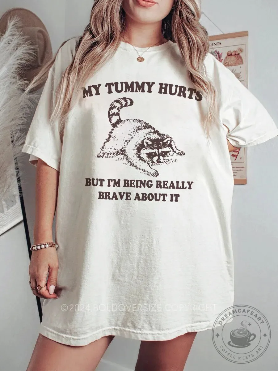 My Tummy Hurts But I'm Being Really Brave About It Raccoon T-Shirt